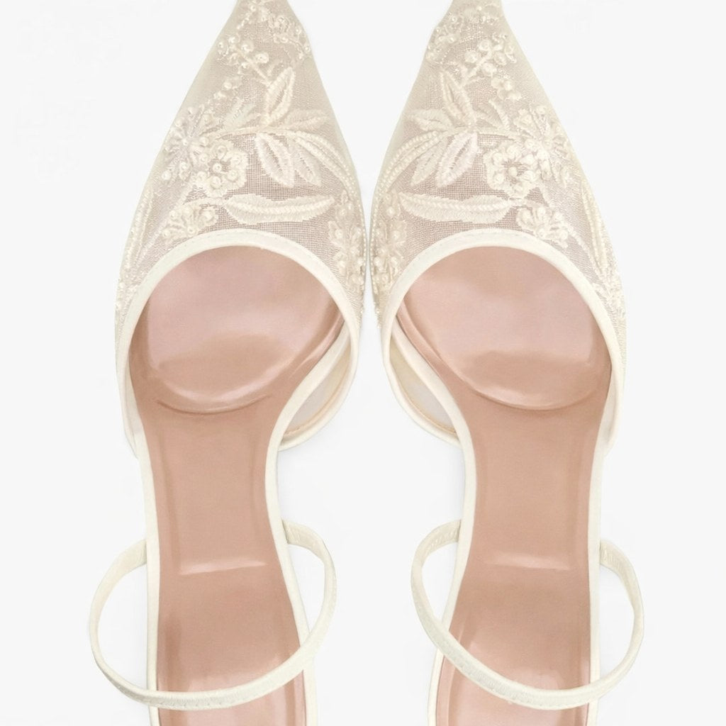 Elegant slip-on embroidered mule heels for women, with a chic pointed toe, suitable for special events.