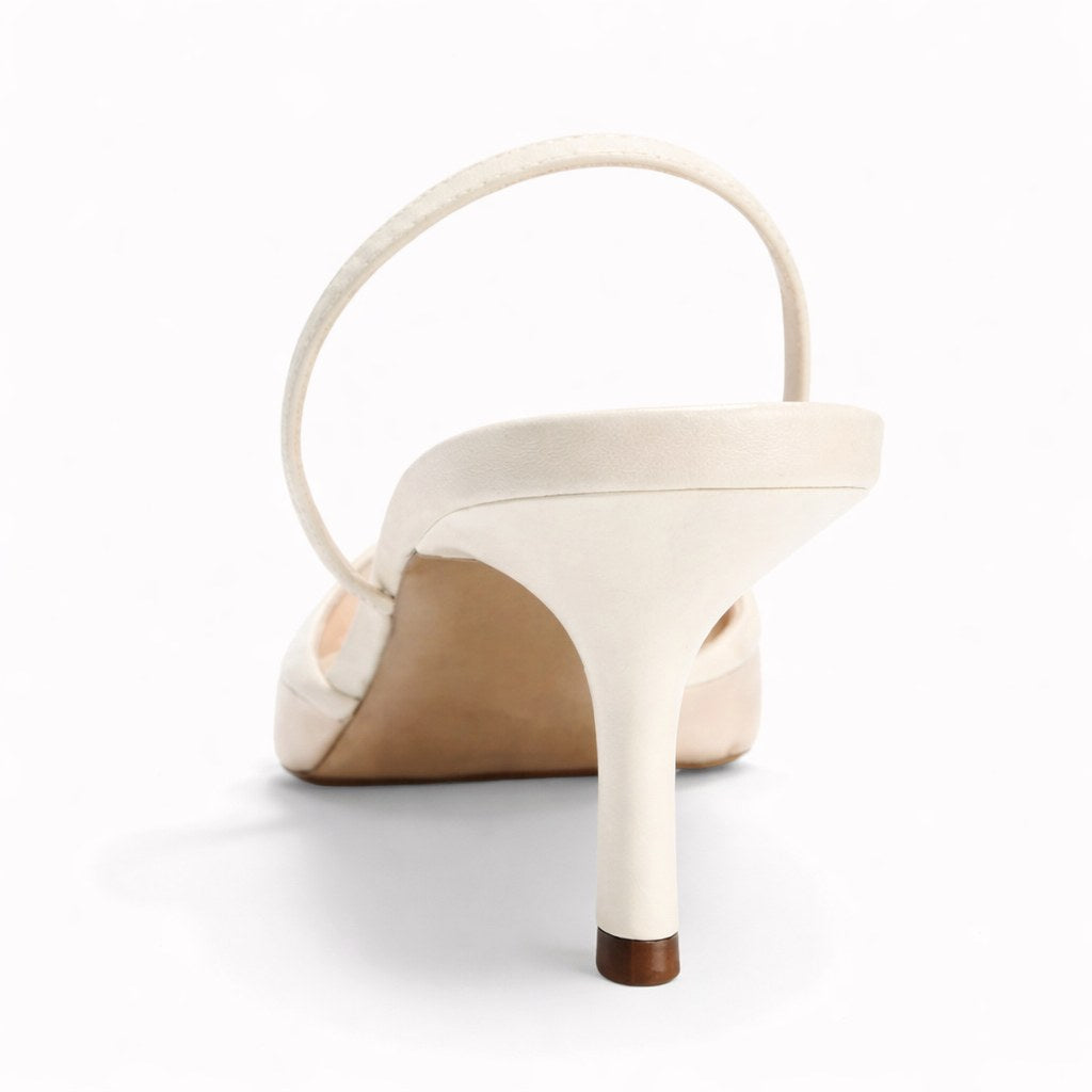 Fashionable women's occasion shoes: embroidered mule heels with a stylish pointed toe design.