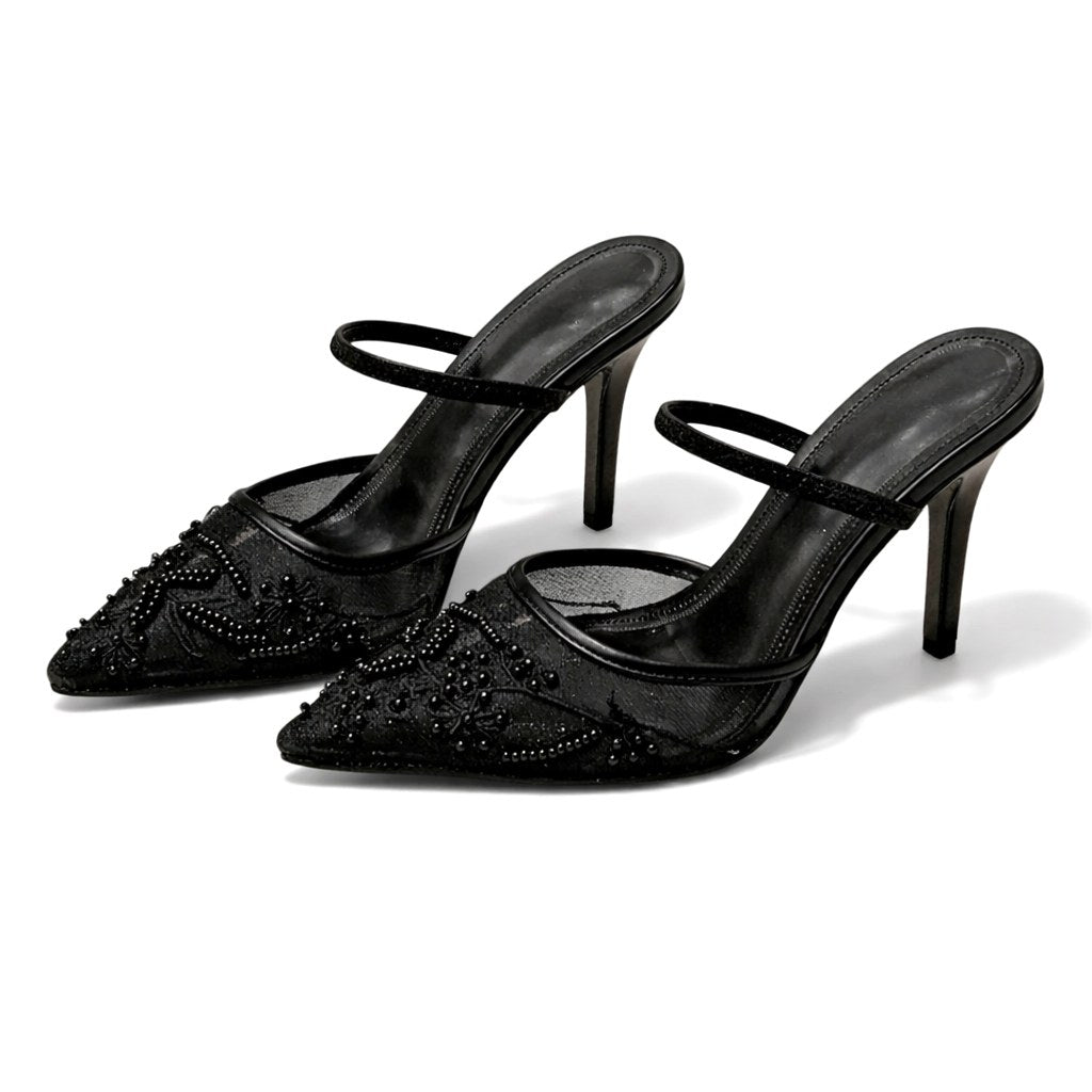 Formal women's pointed toe heels, intricate embroidery on comfortable slip-on mule design, party ready.