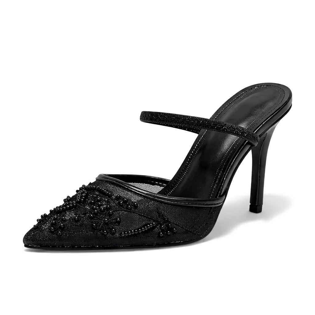 Chic embroidered mule heels for women, featuring a sharp pointed toe, ideal for evening wear & events.