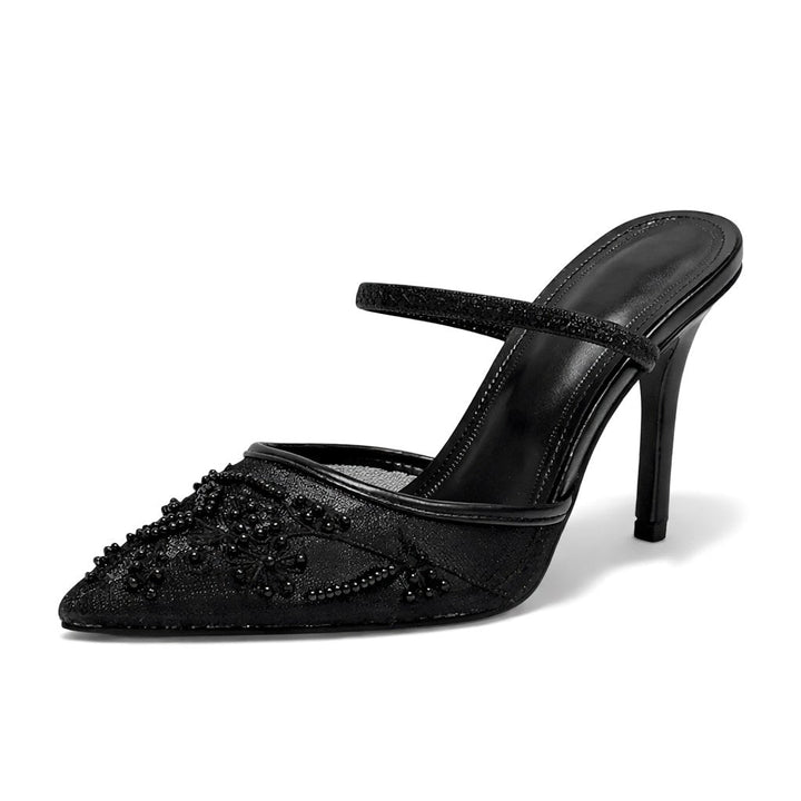 Chic embroidered mule heels for women, featuring a sharp pointed toe, ideal for evening wear & events.