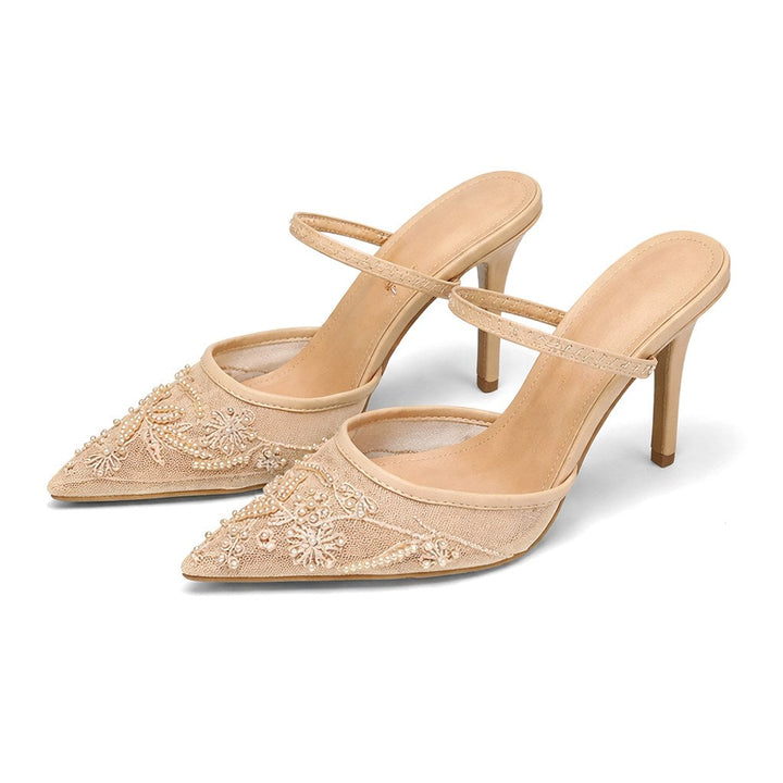 Women's dress shoes: elegant embroidered pointed toe mule heels, perfect for sophisticated style.