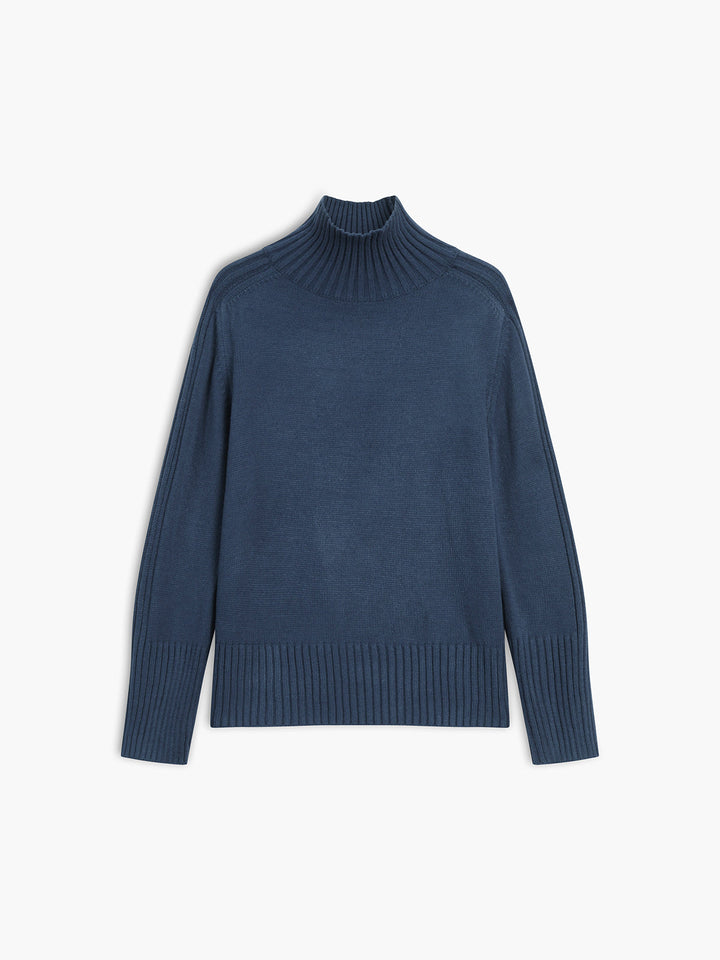 Relaxed fit women's navy ribbed knit sweater; a versatile mock neck top ideal for layering.