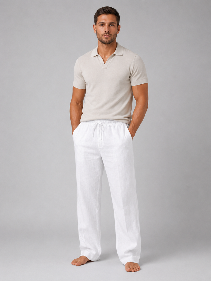 White men's relaxed fit linen pants with drawstring, ideal for warm weather, beach, and casual outings.