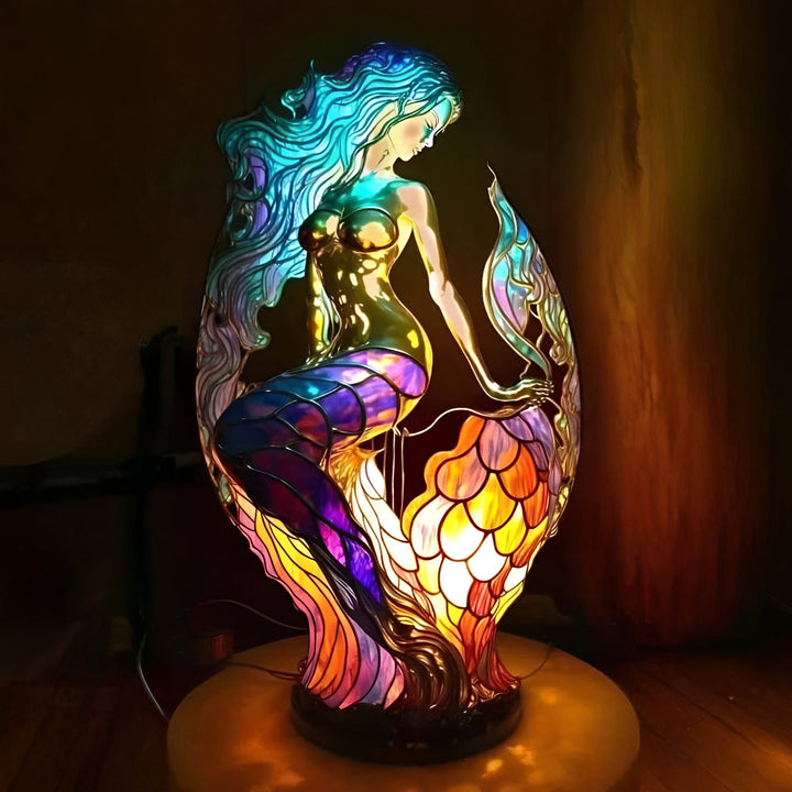 Bright stained glass hummingbird table lamp, decorative sculpture and colorful light.