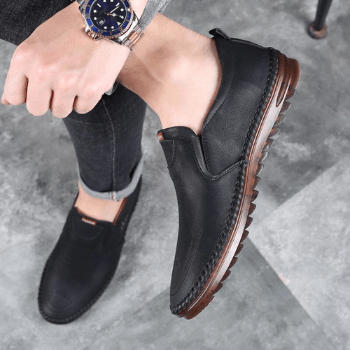 Comfortable men's orthopedic slip-on loafers providing arch support & plush cushioning for all-day wear.