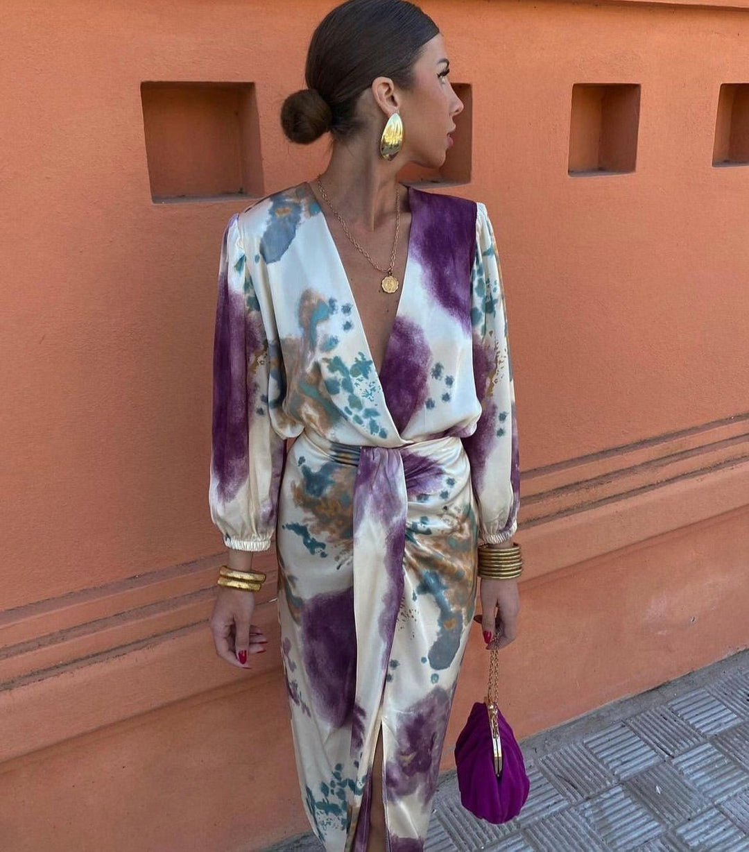 Versatile women's belted wrap midi dress, featuring a flattering V-neckline. Ideal for elegant events.
