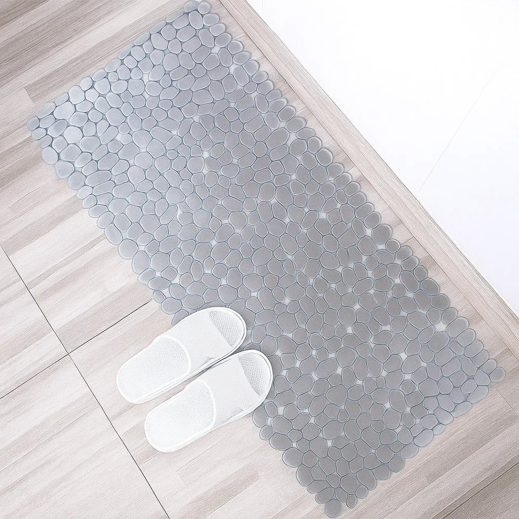 Unisex anti-slip shower mat designed for ultimate bathroom safety & comfort. Durable, easy-clean PVC.