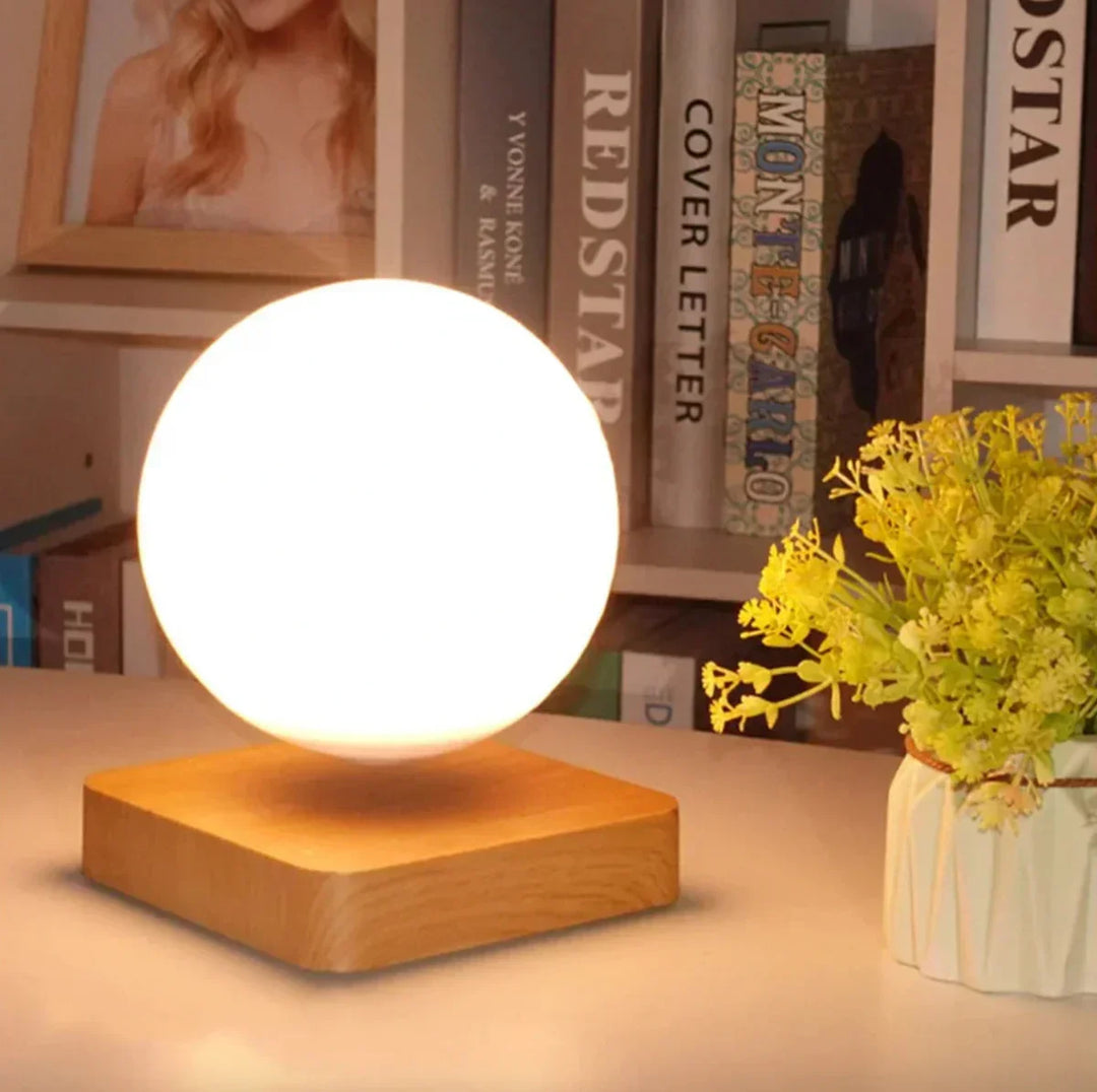 Elegant LunaFloat levitation moon lamp, perfect for ambient lighting and unique home decor. A stunning wireless LED night light.