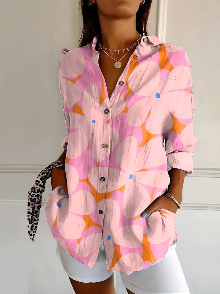 Women's printed fluid shirt with long sleeves, offering effortless style and relaxed comfort for everyday wear.