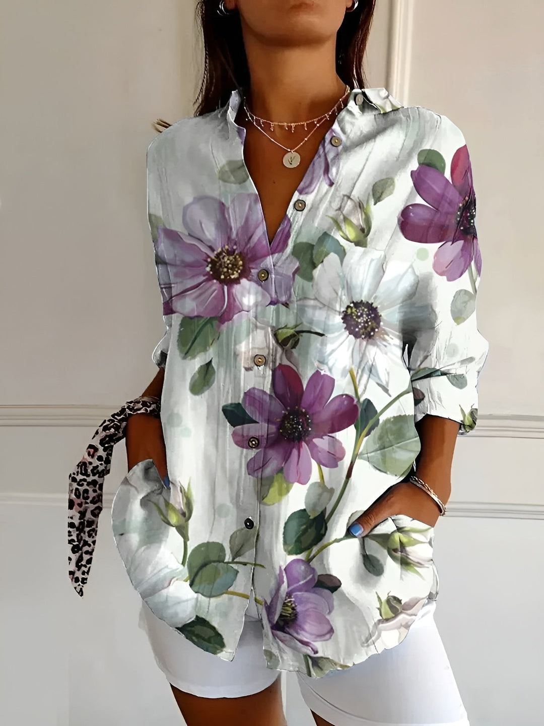 Beautifully printed women's blouse with a fluid fabric, offering effortless elegance and comfort.