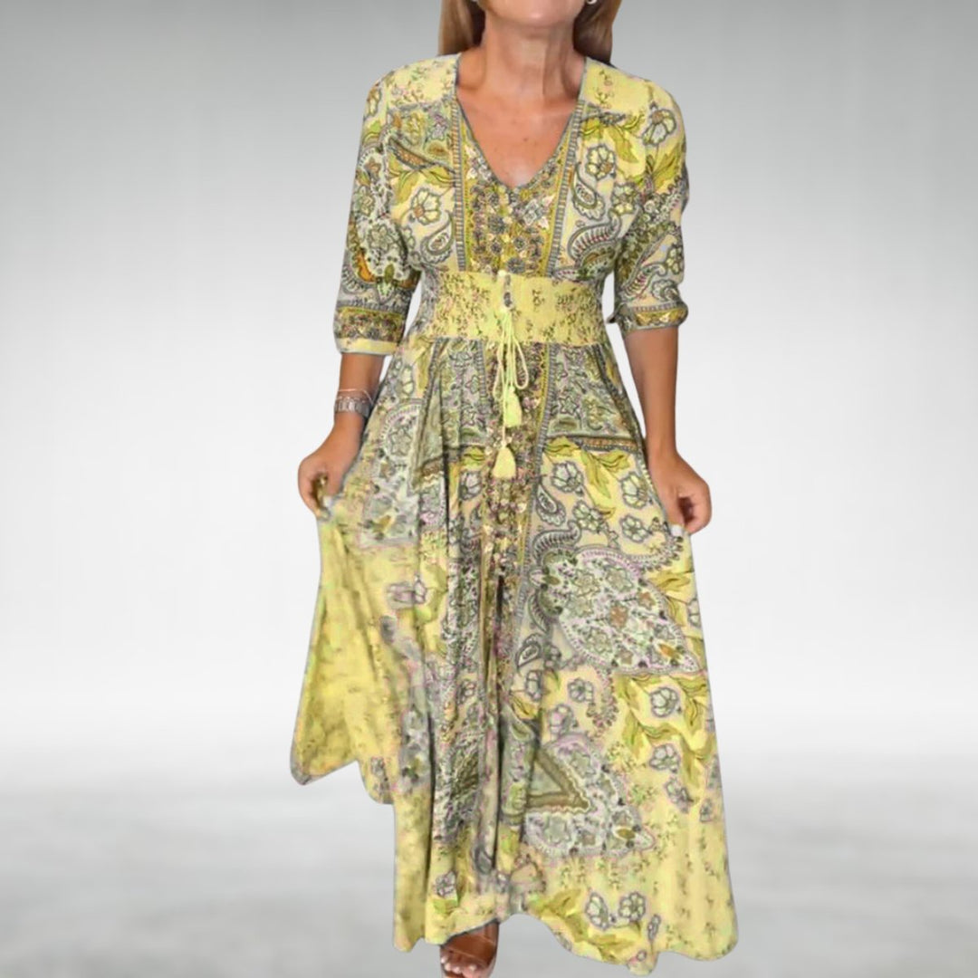 Stylish women's summer maxi dress with intricate paisley print & V-neck, embracing bohemian fashion.