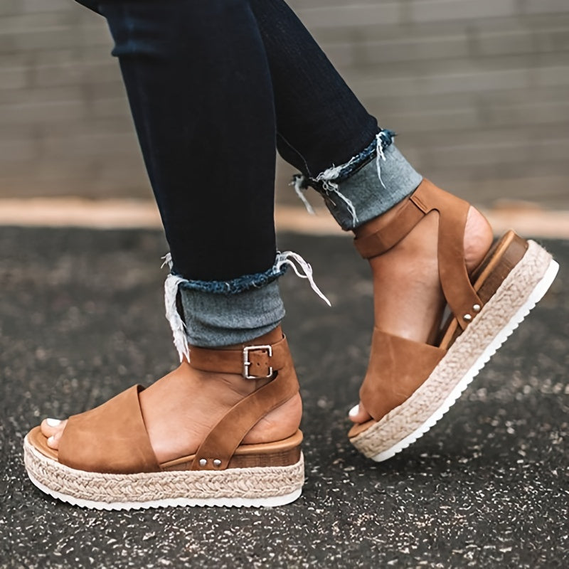 Women's stylish espadrille wedge sandals with ankle strap, perfect for summer casual wear.