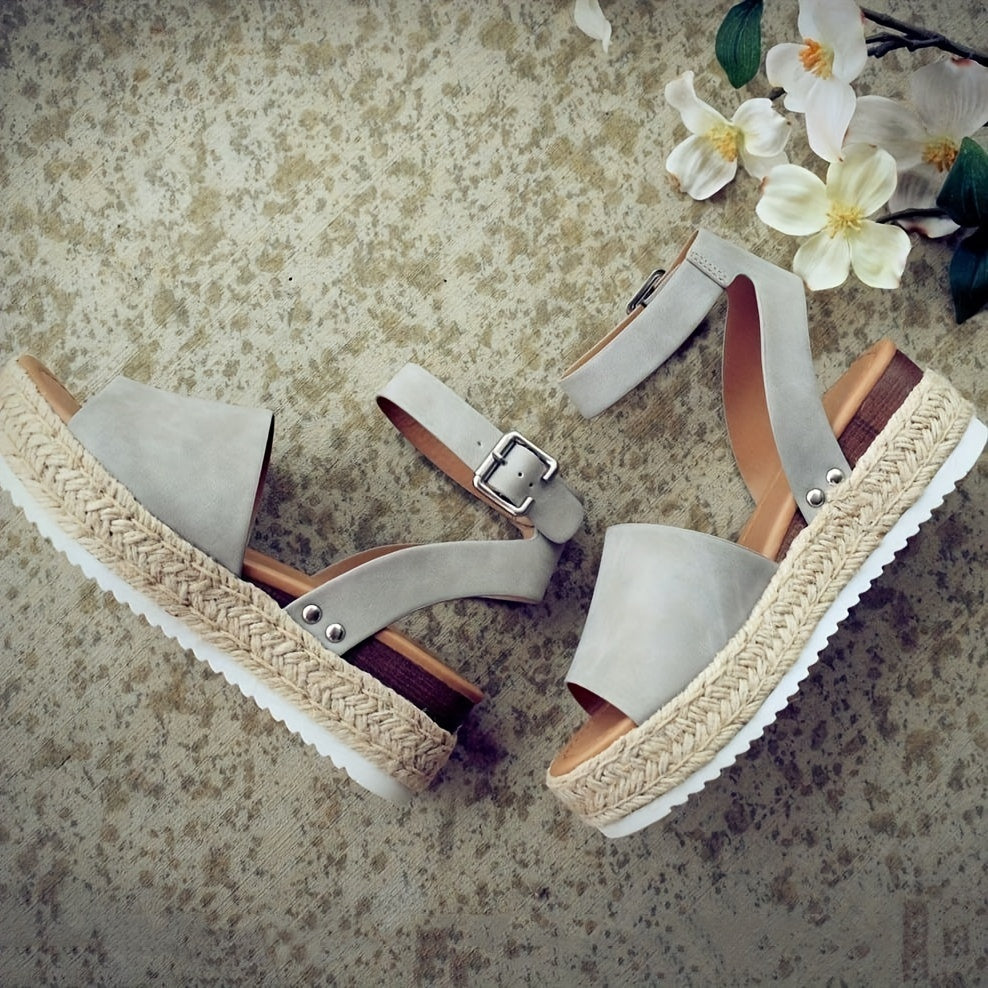 Women's comfortable espadrille wedge sandals, chic ankle strap buckle, ideal for summer outings.