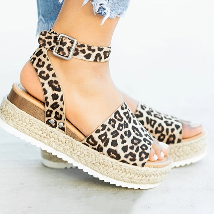 Chic open-toe espadrille wedge sandals for women, comfortable platform and adjustable ankle strap.