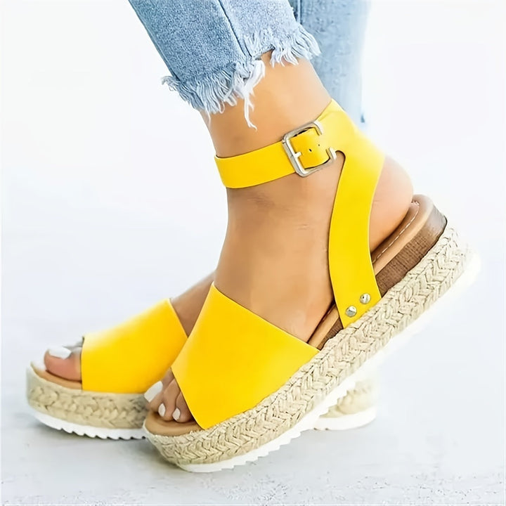 Comfortable women's espadrille wedge platform sandals, stylish open toe and ankle strap design.