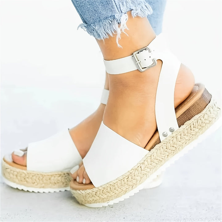 Women's casual espadrille wedge sandals with an ankle strap, perfect for warm weather activities.