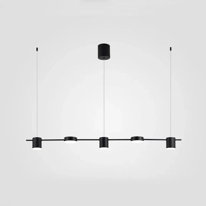 Close-up of AuraDrum gold pendant light showing textured aluminum shade