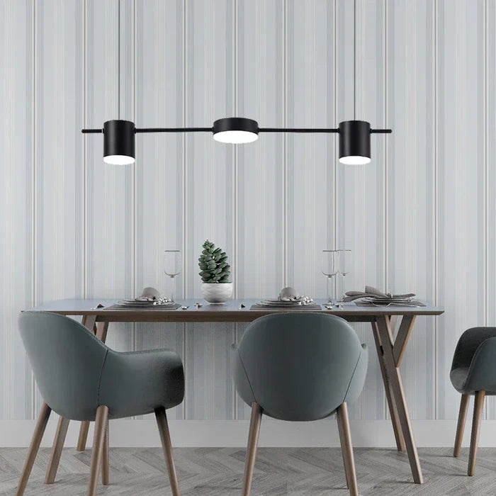 Installation view of AuraDrum gold pendant light in a stylish interior