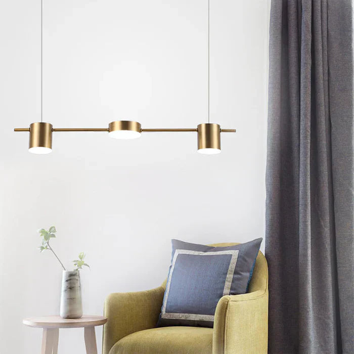 Installation view of AuraDrum black pendant light above a dining table