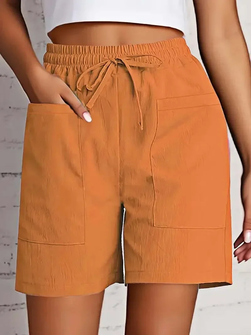 Classic women's bermuda shorts with pockets, perfect for summer casual wear & comfortable everyday style.