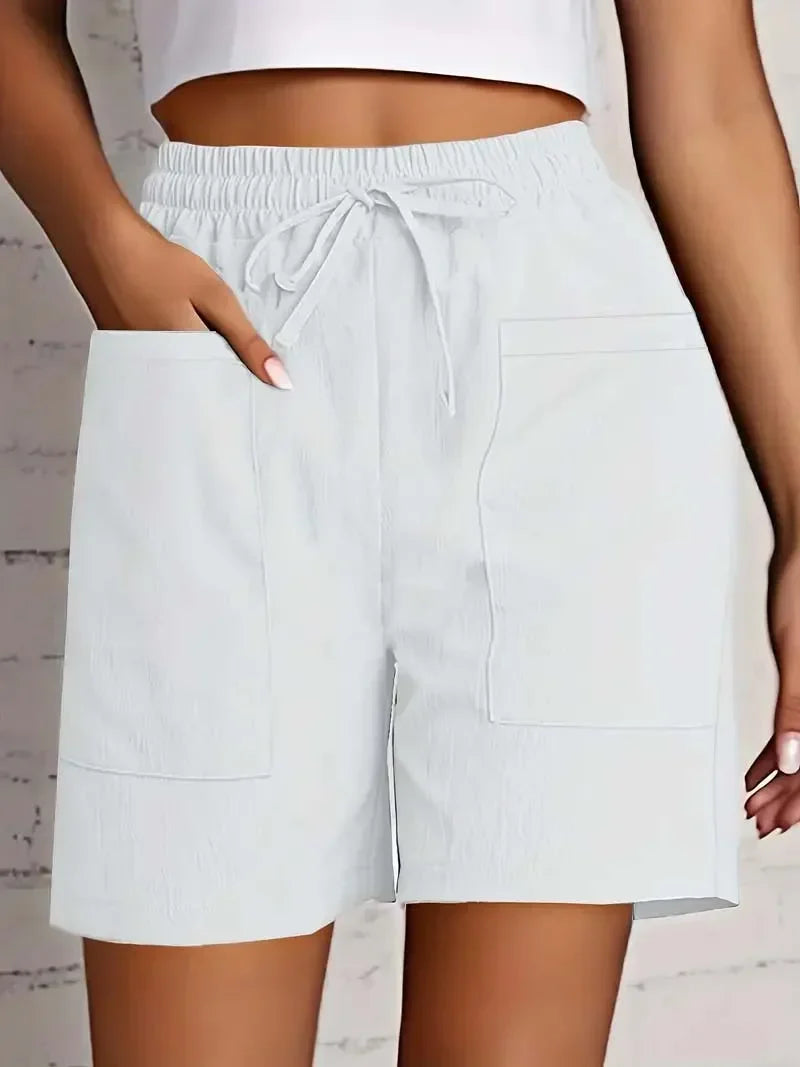 Soft & comfortable women's bermuda shorts with pockets, essential for summer fashion & everyday style.
