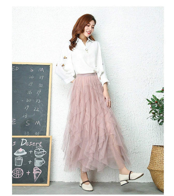 Women's chic high waist tiered midi skirt, a versatile ruffle A-line fashion piece.