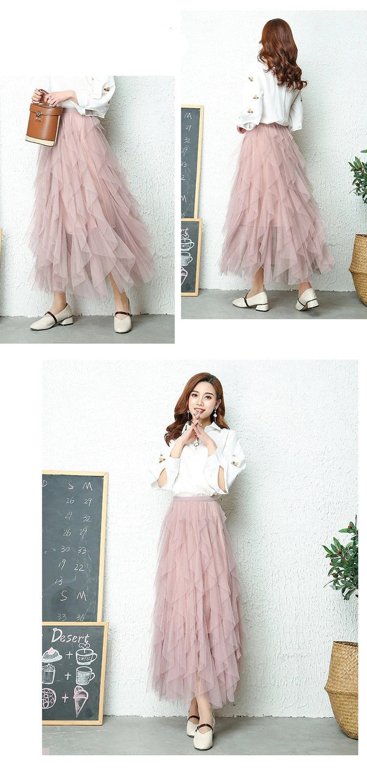 Stylish women's high waist tiered midi skirt with a lovely flowing silhouette and elegant design.