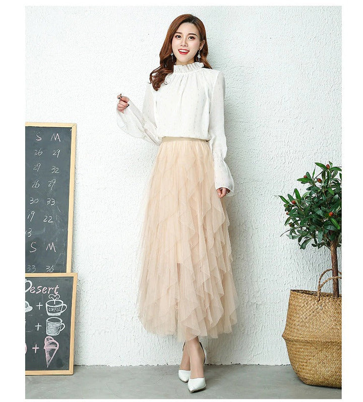Comfortable high waist tiered midi skirt with a chic, flowing design for any occasion.