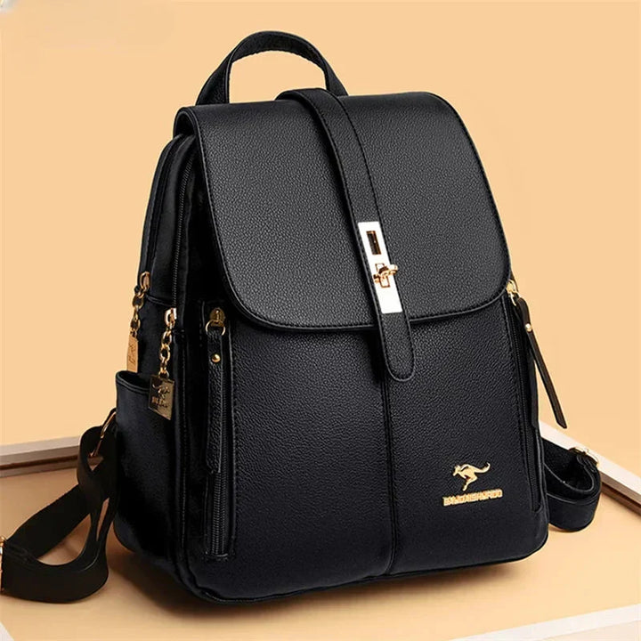 Elegant women's black leather backpack, ideal for work and travel. Stylish & functional everyday carry in premium leather.