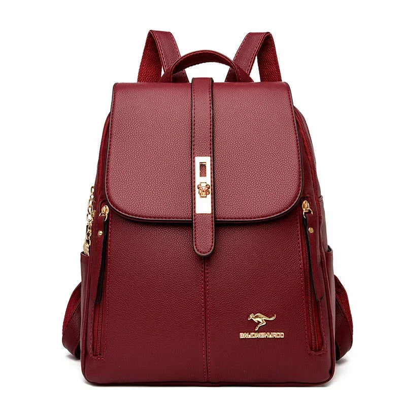 Functional women's leather work backpack with ample space for laptops. Elegant design for business and daily use.