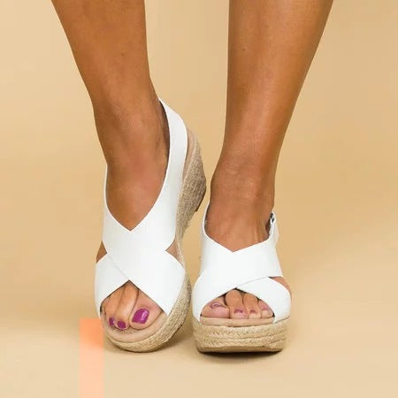 Women's resort wear espadrille wedge sandals, open-toe crisscross style, ideal for summer.