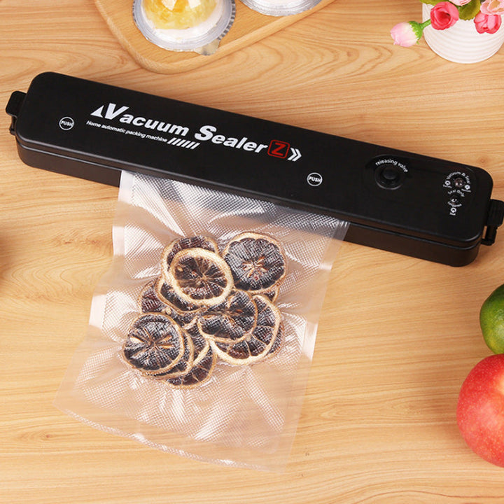 Complete food preservation kit: automatic vacuum sealer with starter vacuum bags, a kitchen gadget.