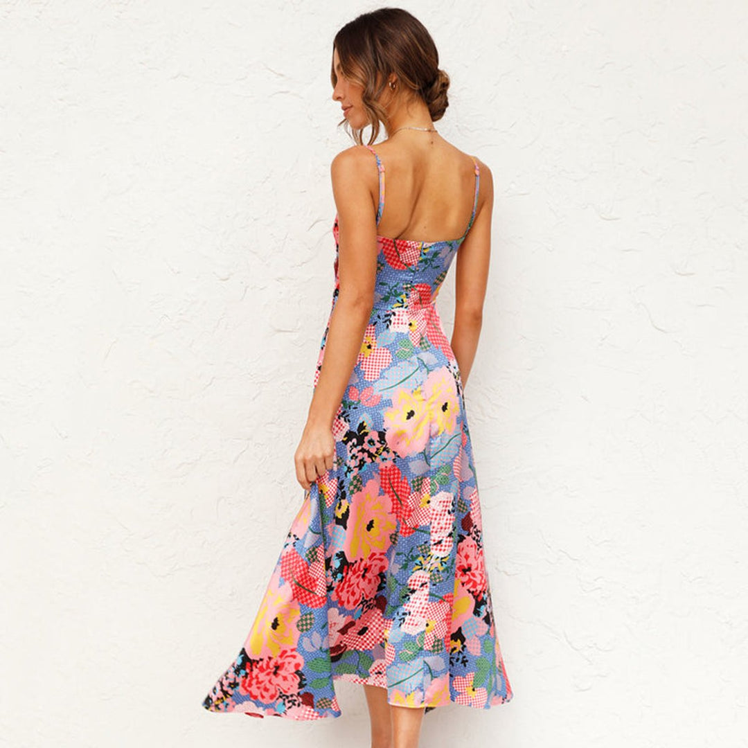 Women's elegant floral print tie-front maxi dress in green, a stylish sleeveless summer occasion dress.