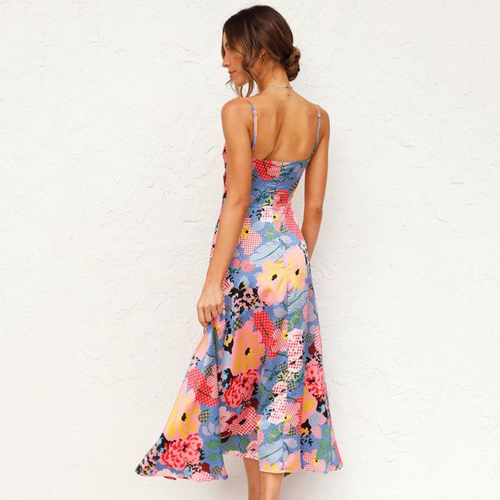 Women's elegant floral print tie-front maxi dress in green, a stylish sleeveless summer occasion dress.