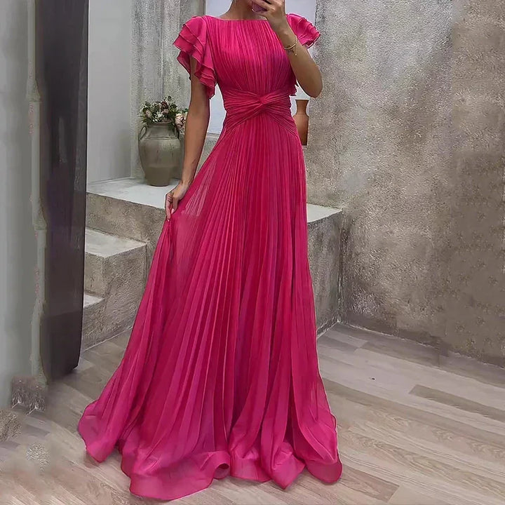 Chic women's cocktail dress featuring elegant flutter sleeves and delicate pleats, ideal for parties.