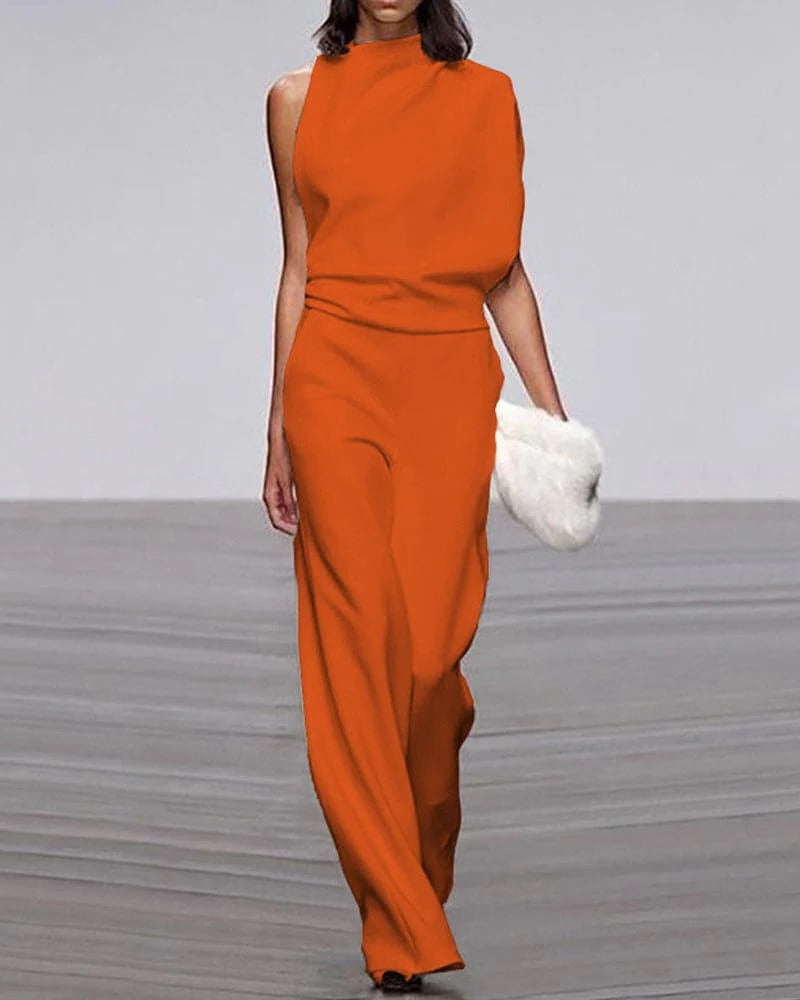 Formal women's wide leg jumpsuit with mock neck, draped shoulder. A chic & versatile evening outfit.