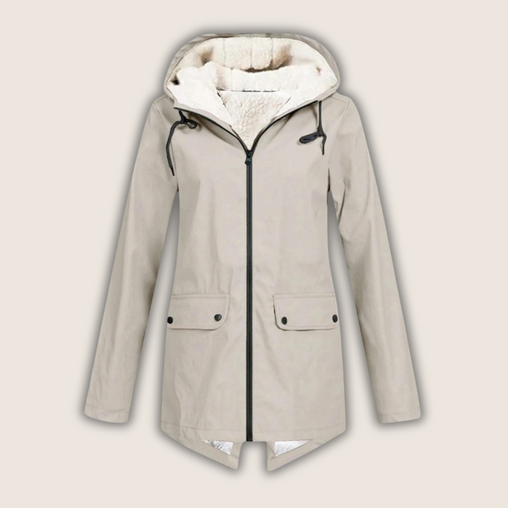 Practical women's waterproof raincoat with adjustable hood, lightweight & breathable for travel & hiking.