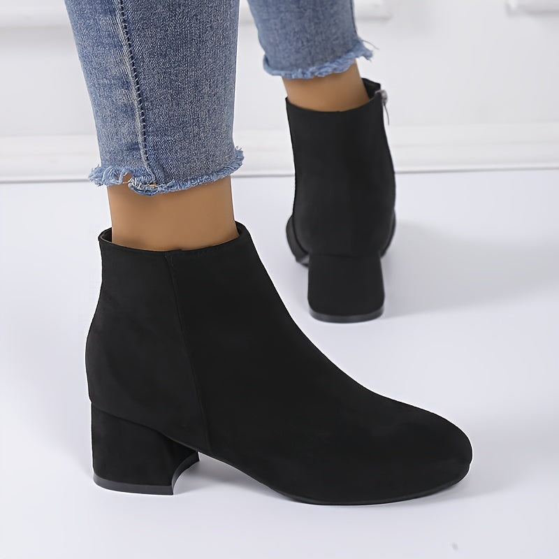 Elegant women's Chelsea ankle boots with comfortable block heel. Versatile footwear for stylish fall & winter fashion.