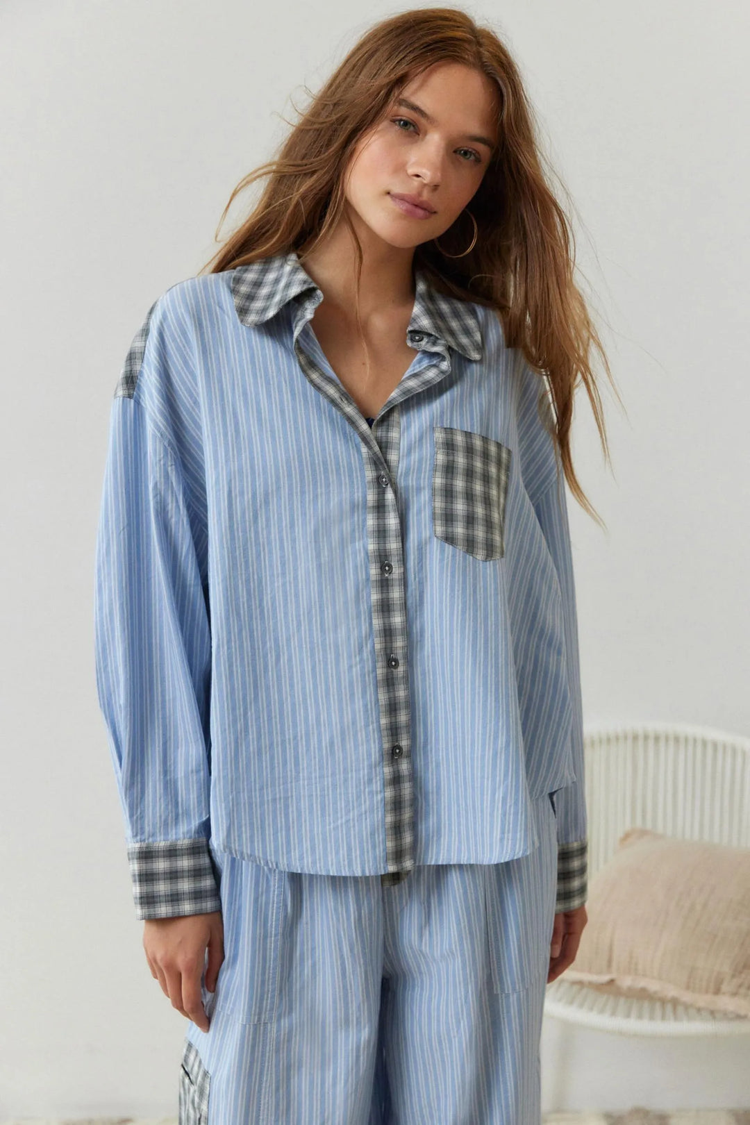 Women's ultra-soft pink cotton pajama set, perfect for cozy and relaxing nights. Comfortable loungewear.