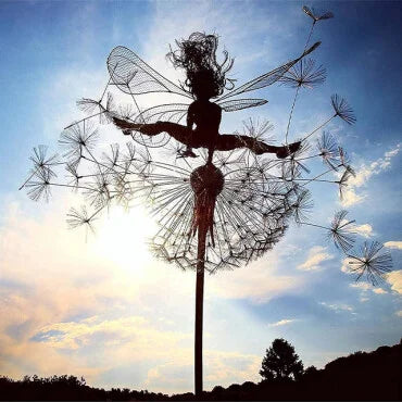 Whimsical metal fairy garden stake with intricate design. Adds magical outdoor decor to any enchanted landscape.