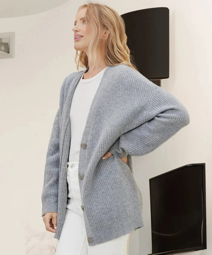 Relaxed fit khaki knit cardigan vest for women, a modern and cozy layering essential.