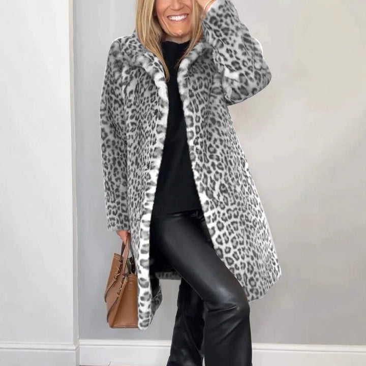 Women's leopard print lightweight puffer winter coat. Stylish animal print outerwear for warmth & fashion.