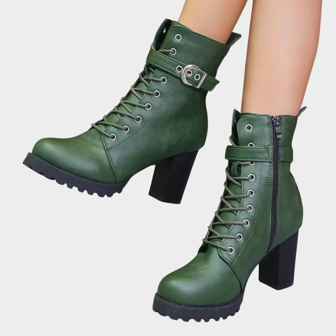Stylish women's lace-up combat boots, featuring a sturdy block heel & buckle details. Perfect for streetwear.