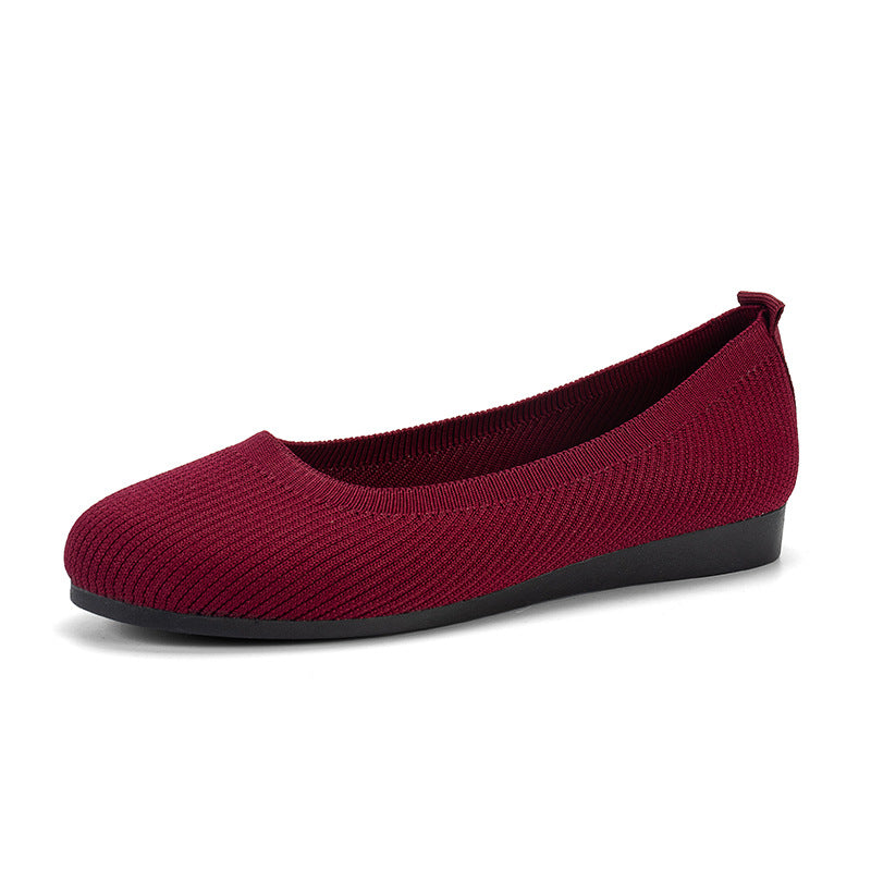 Women's casual comfort shoes, slip-on style with orthopedic arch support and roomy wide fit.
