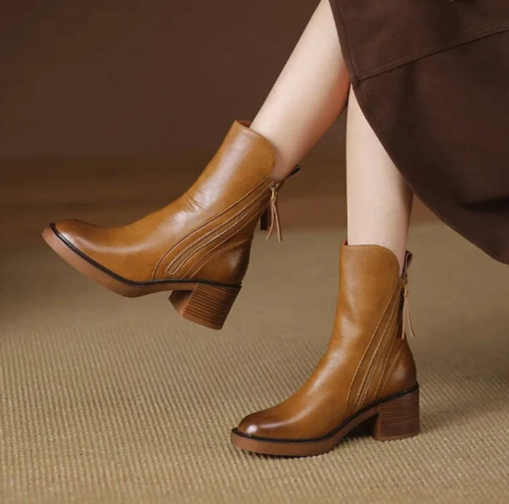 Women's chic block heel ankle boots with side zip. Versatile and comfortable for everyday elegant fashion.