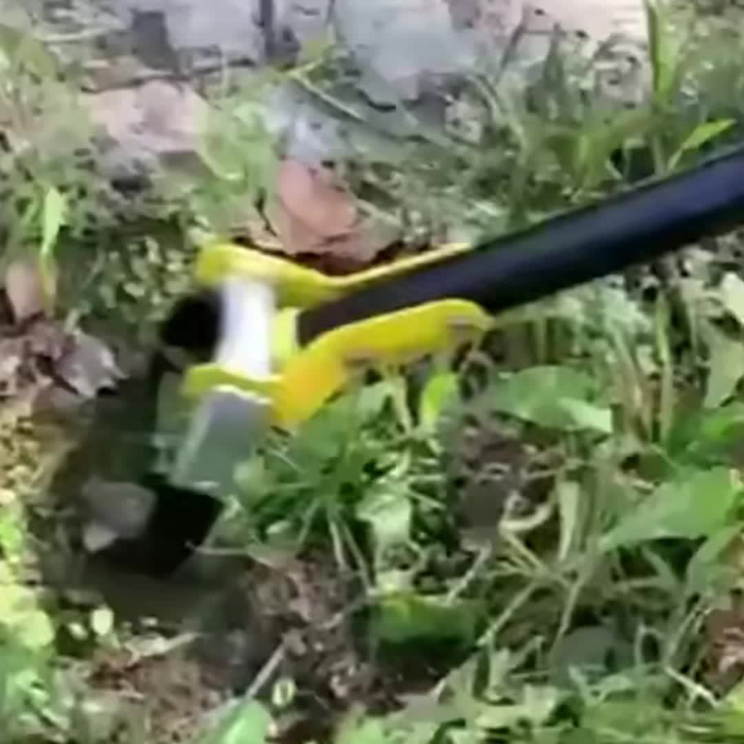 Premium ergonomic garden tool with a triangular head for efficient weeding and soil prep.