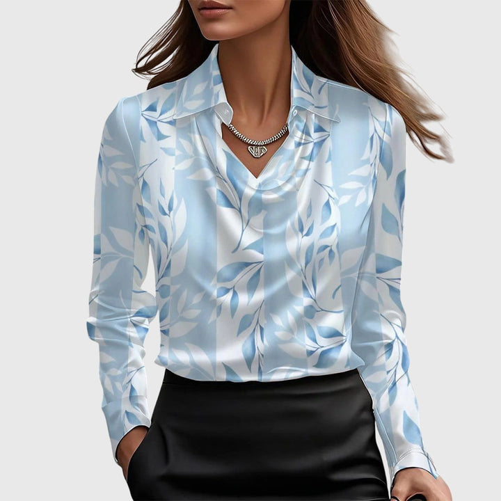 Versatile women's blouse, casual elegance with a pleated neckline. Perfect fashion top for any occasion.