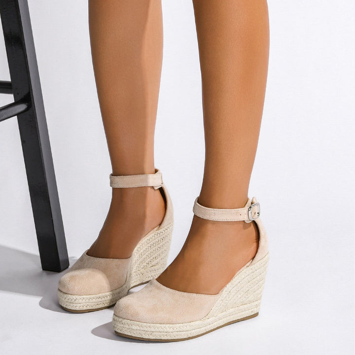 Elegant women's high-heel sandals with intricate woven straps, perfect for summer parties.