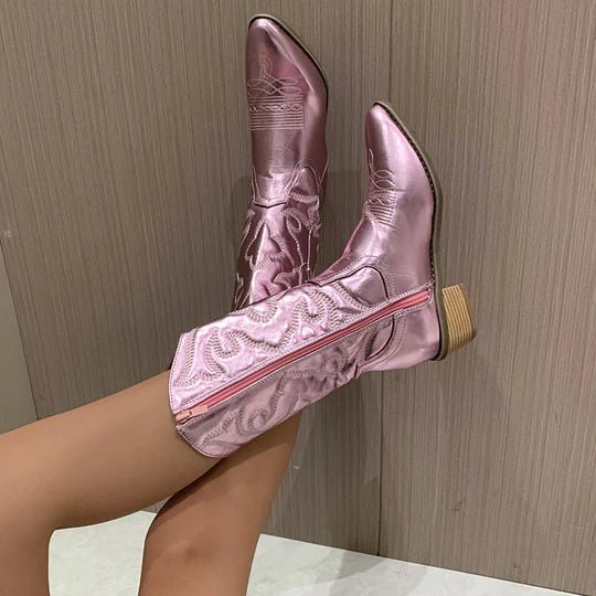 Women's chic metallic cowboy boots. Shiny Western style footwear for fashion.
